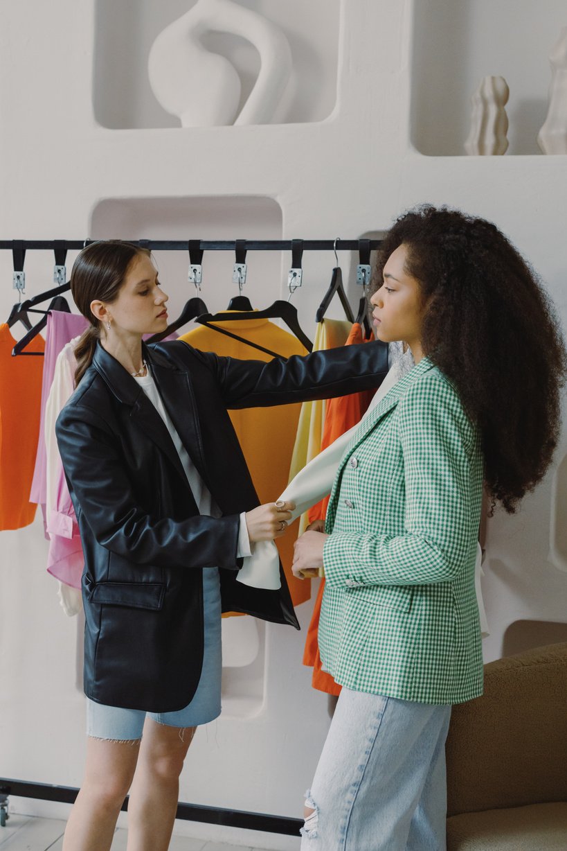 Two Women Fitting Clothes